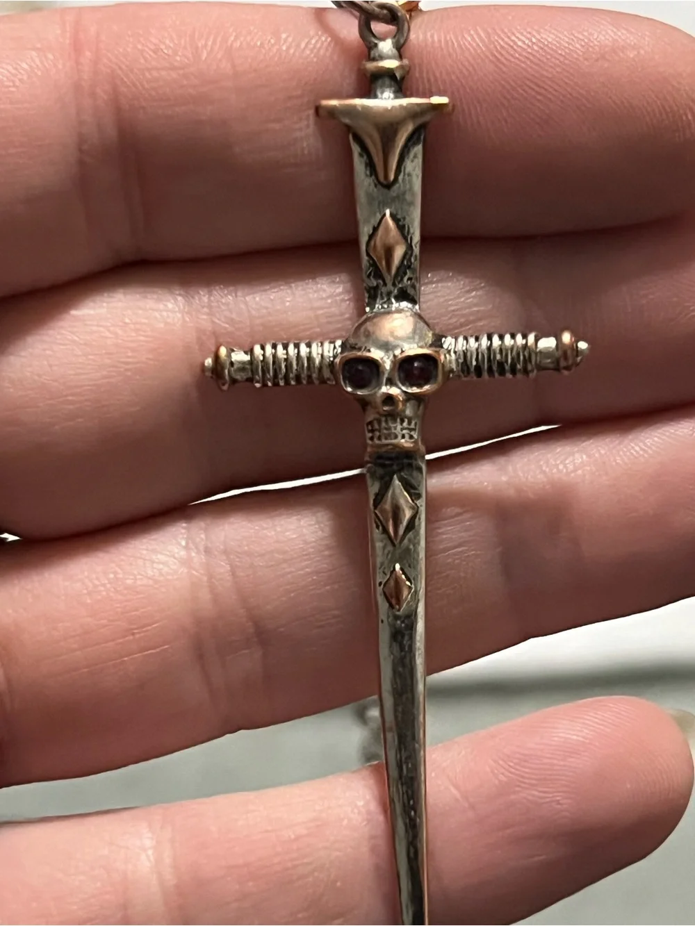 Silver Dagger Cross Necklace with Red Stone Eyes